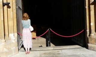 Kristine Coomes on brink of the abyss – or to put it another way, at the west door of Norwich Cathedral