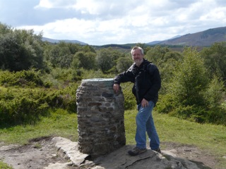 Yes, it's me, at a viewpoint above Braemar and looking over towards the Cairngorms (that's the camera, not me)