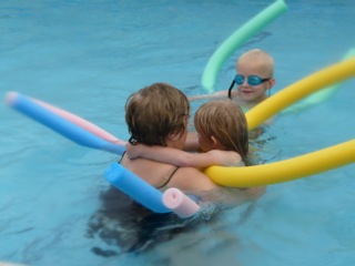 Dot, Amy and Oliver taking full advantage of the swimming pool that came with our holiday cottage