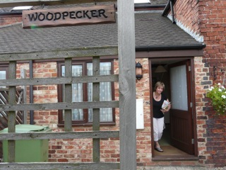 Dot at the door of our Cheltenham cottage