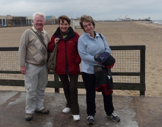 Dave, Julia and Dot on a fishing pier at Yarmouth. Low tide.