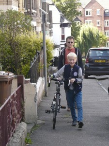 New bike successfully purchased – officially for Oliver's birthday tomorrow, but he seems to have got wind of it...