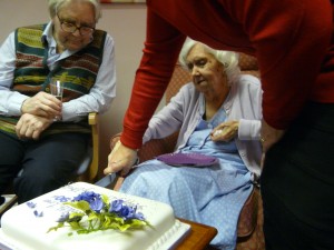 Ethel, her friend John and Dot's new top feature in the cake-cutting