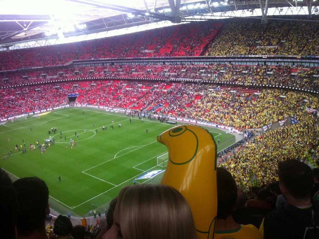 Canaries celebrate their play-off final victory.