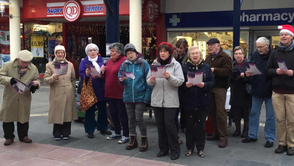 Carol-singing in Anglia Square.