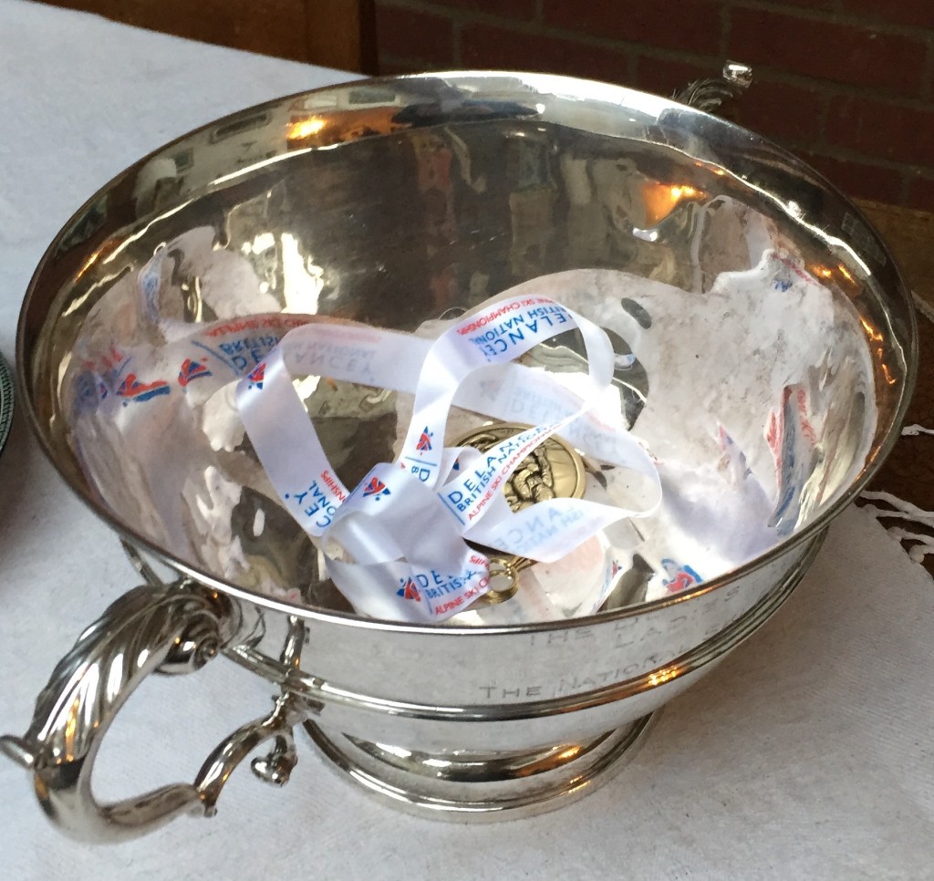 Yes, it's a skiing trophy, with a gold medal almost visible.