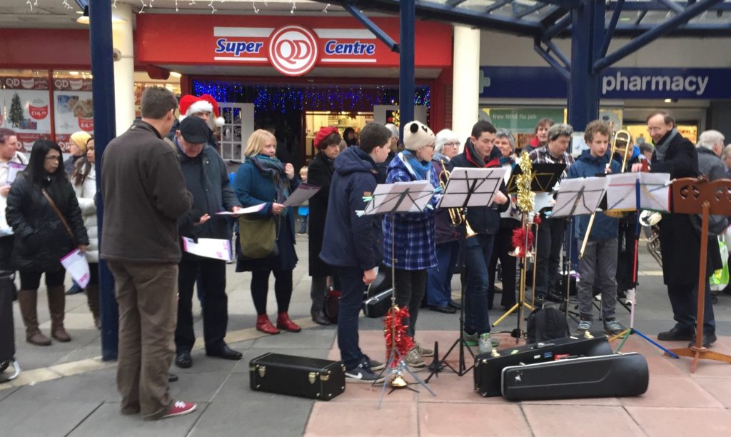 On the brink of a Silent Night in Anglia Square. Dot is in the red hat.