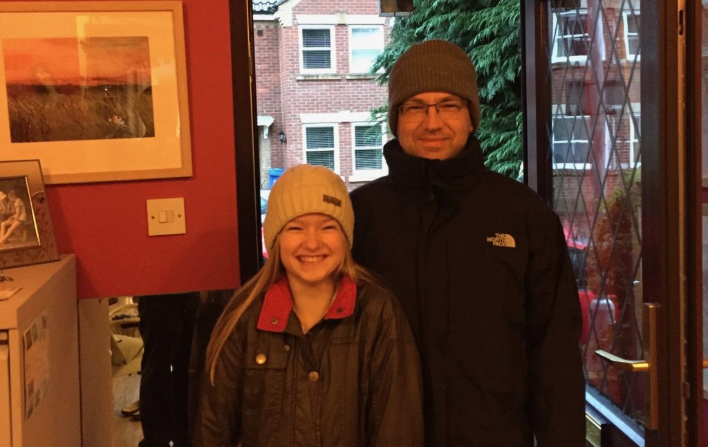 Amy and David prepare for an excursion into the city, possibly on New Year's Day.