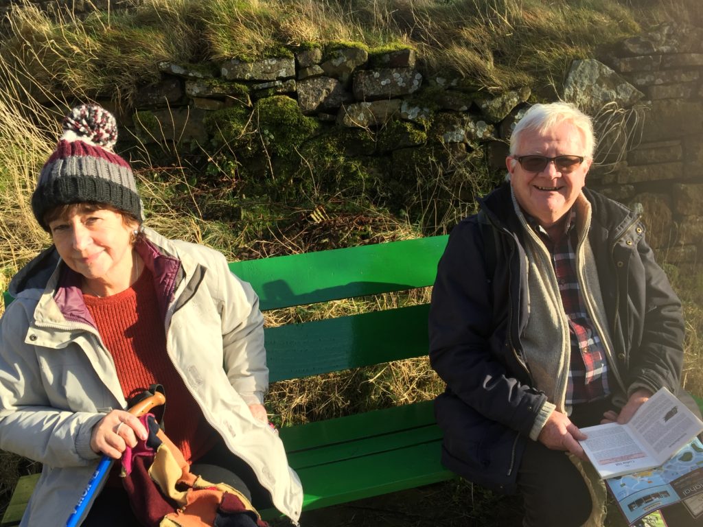 Dot and Dave, both still in good health, nearing the road crossing on the way up Corbar HIll.
