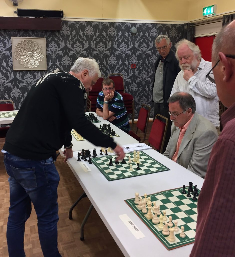 John Nunn playing the inal game of his simultaneous exhibition – against Mervyn Hughes, who also lost. Final score +16 =3.