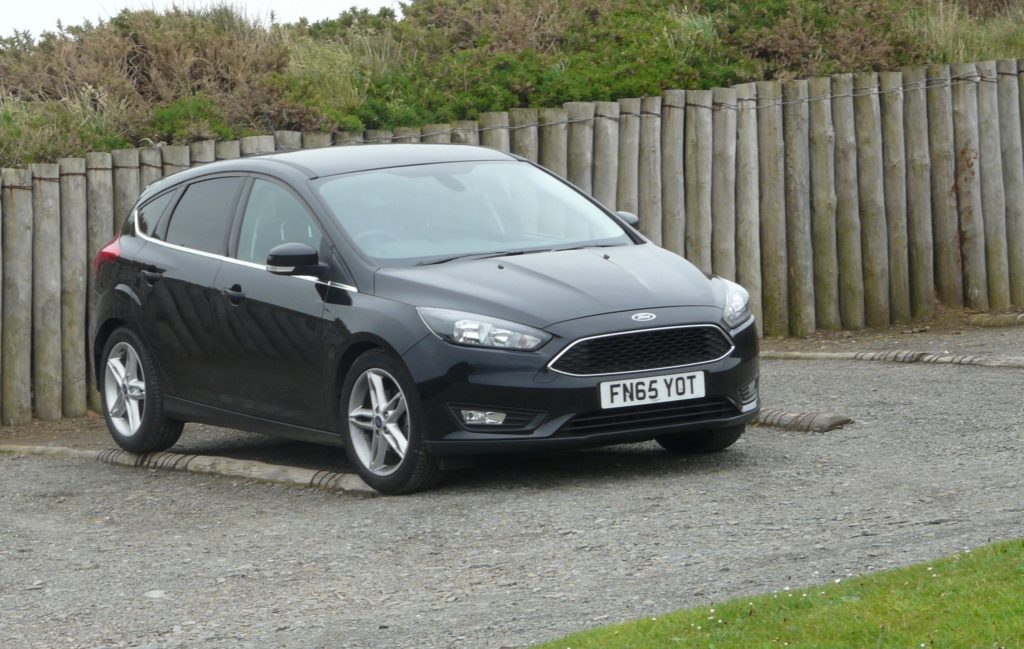 Our hire car, not very well parked (at Crovie, later in the holiday).
