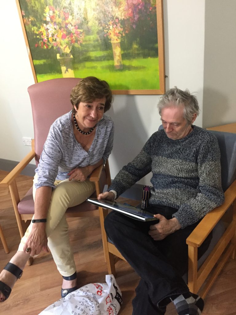 Andrew opening his birthday presents, with Dot in attendance.