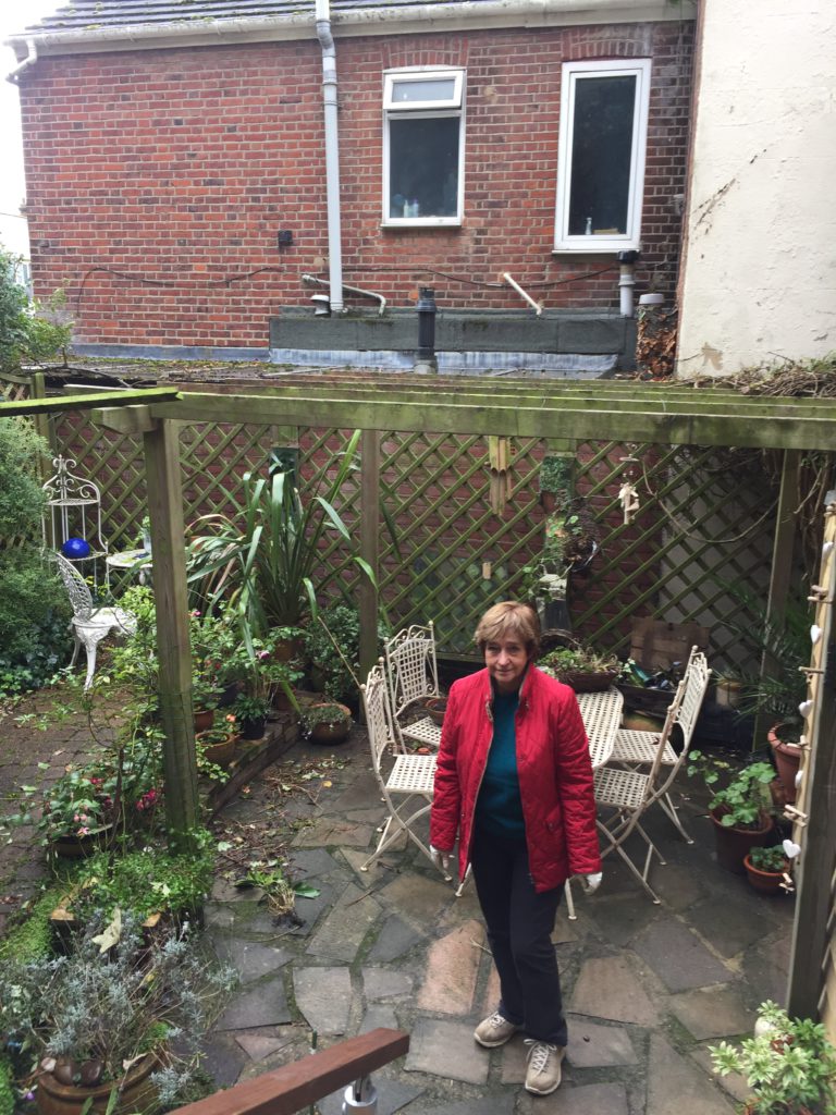 Dot in a rather bare back garden.