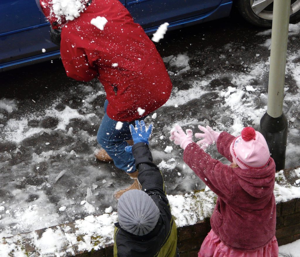 Ten years ago: Oliver and Amy attack Nana with snowballs.