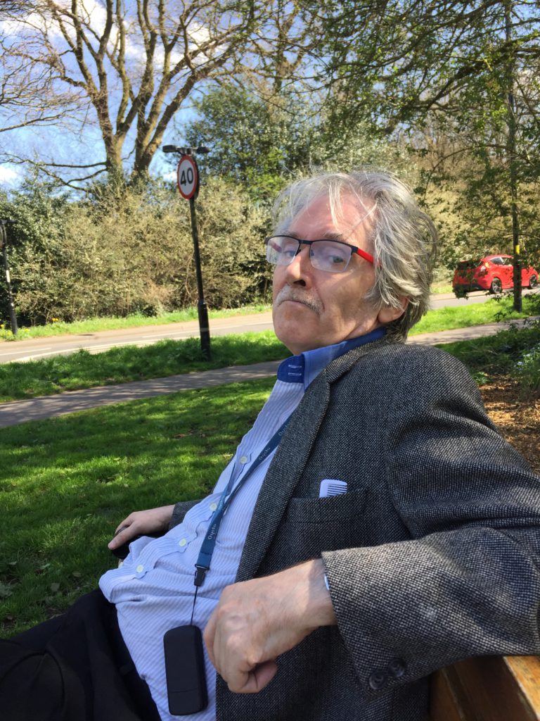 Andrew takes a break on walk to Memorial Park.