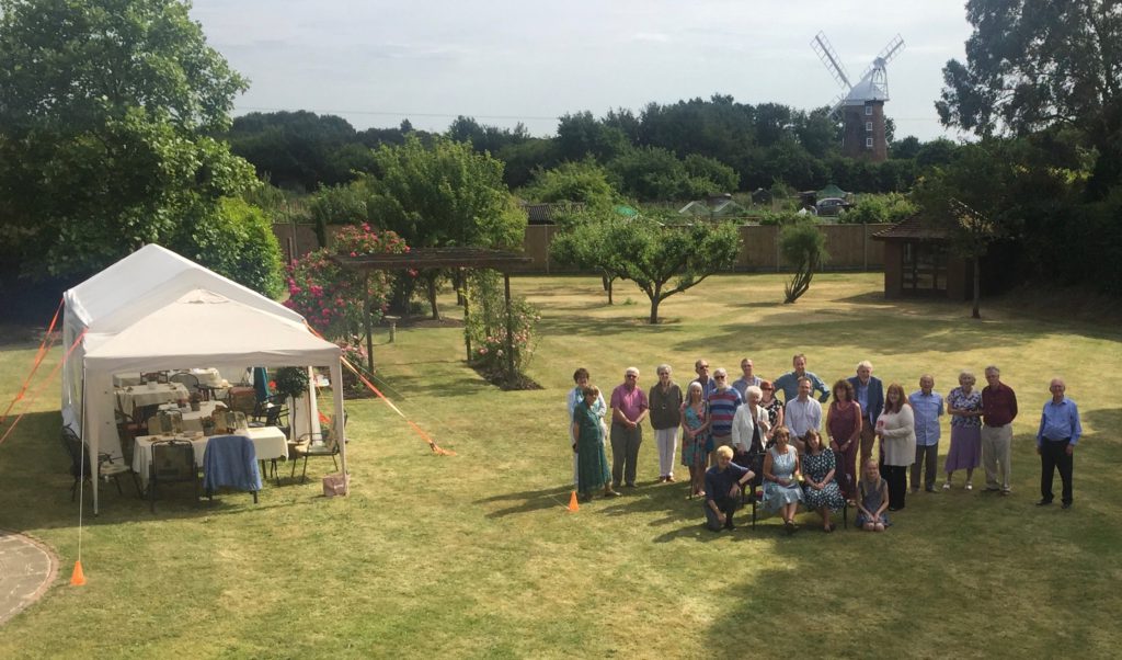 Golden wedding guests gather.